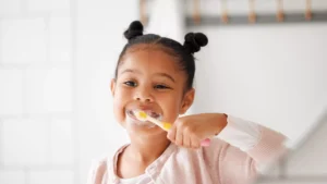 smiling-girl-with-toothbrush